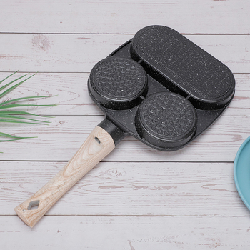 Kodumajapidamises praepann hommikusöögi munaburgeri pannkoogivorm nelja auguga praemunapann praemunaburgerimasin mittenakkuva panniga