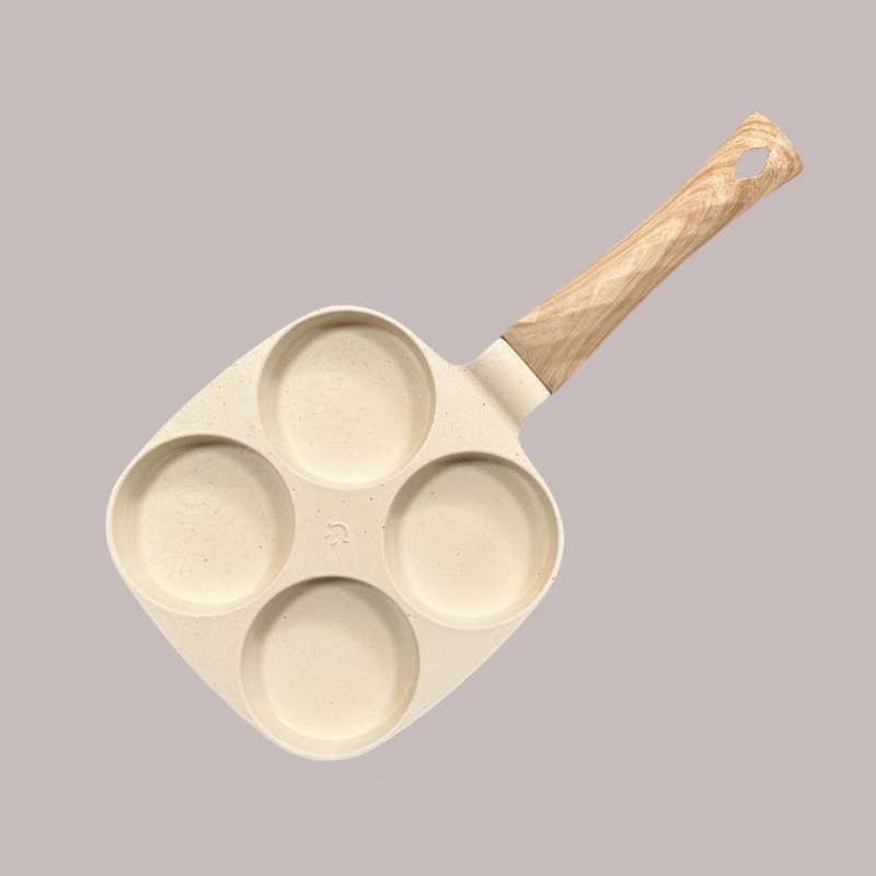 Kodumajapidamises praepann hommikusöögi munaburgeri pannkoogivorm nelja auguga praemunapann praemunaburgerimasin mittenakkuva panniga