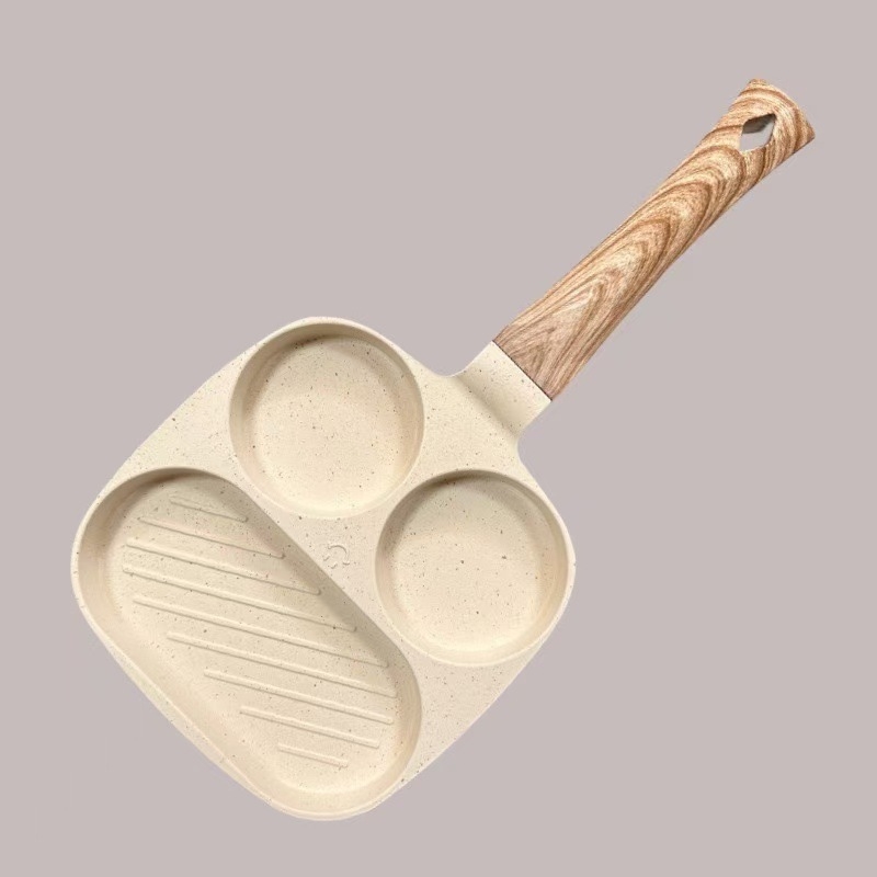 Kodumajapidamises praepann hommikusöögi munaburgeri pannkoogivorm nelja auguga praemunapann praemunaburgerimasin mittenakkuva panniga