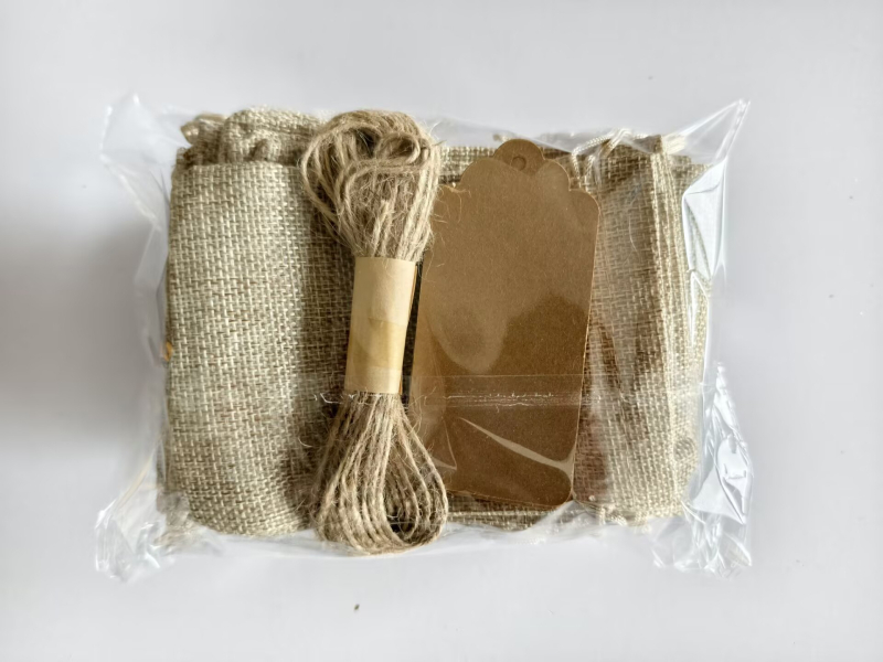 Tehase hulgimüügi linane pingutusnööriga väike riidest kott Draakoni paadifestivali pakendi linane kott tekstiga mängi väike linane ehtekott