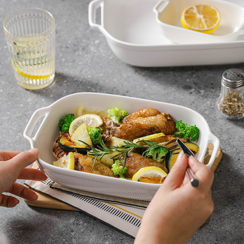 Vabaaja puhasvalge keraamiline ristkülikukujuline kahe kõrvaga küpsetuspann juustuga küpsetatud riisikauss kõrge temperatuurikindel majapidamisküpsetuskauss suupistekauss aurutatud kalataldrik