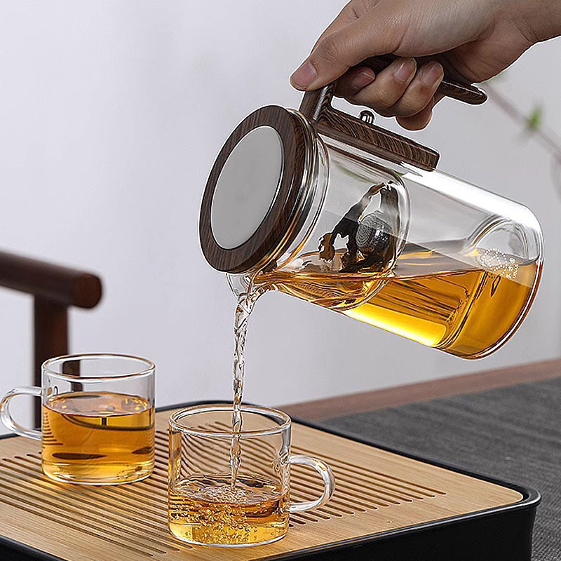 Vardata magnetiline lendlev tass klaasist vooderdisega teekannu tee eraldamine ühe võtmega filtriga majapidamistee komplekt laos hulgimüügis