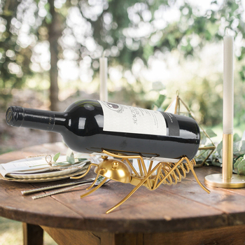 2024 m. raudonojo vyno stovo papuošalai, buitiniai kaltiniai geležiniai skruzdėlės formos dekoratyviniai amatai, vyno stovas, pasviręs, stilius