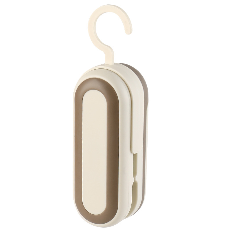 Mini sandarinimo mašina, tarpvalstybinė mažų pakuočių buitinių plastikinių maišelių maisto konservavimo sandarinimo vakuuminė plastiko sandarinimo mašina, užkandžių artefaktas