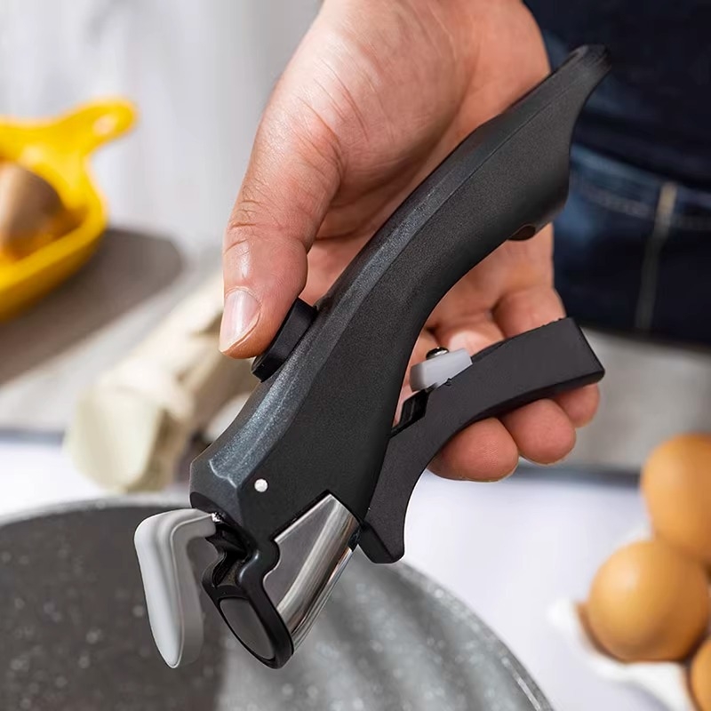 Nuimama rankena nuo nudegimų. Neutrali puodo rankena puodams, dubenims ir kt.