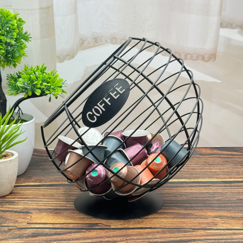 Gamyklinis tarpvalstybinis tiesioginis pardavimas, pasviręs kavos kapsulės geležies laikymo krepšelis, darbalaukio papuošalai, meliono ir vaisių krepšelis.