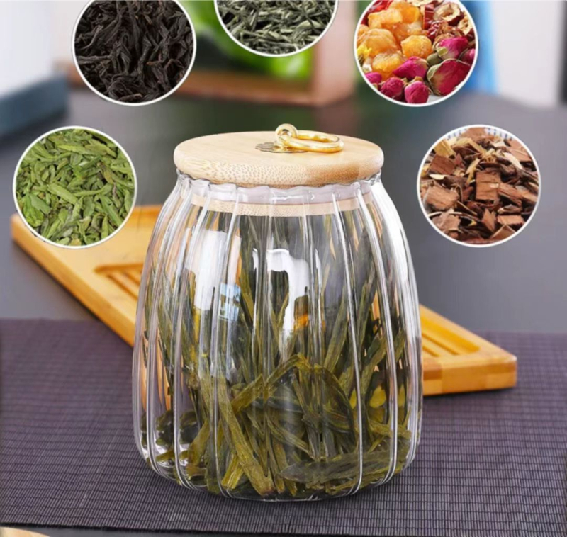 Tehase tarne Kõrgboorsilikaatklaasist suletud purk kuumakindlast klaasist bambusest kaanega teepurk kolmnurkne purk säilituspurk säilituspudel