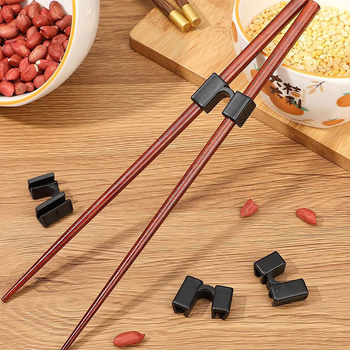 Tarpvalstybiniai karšto pardavimo lazdelių pagalbiniai valgymo maisto spaustukų mokymai, sujungti buitiniai pagalbiniai lazdelių treneriai