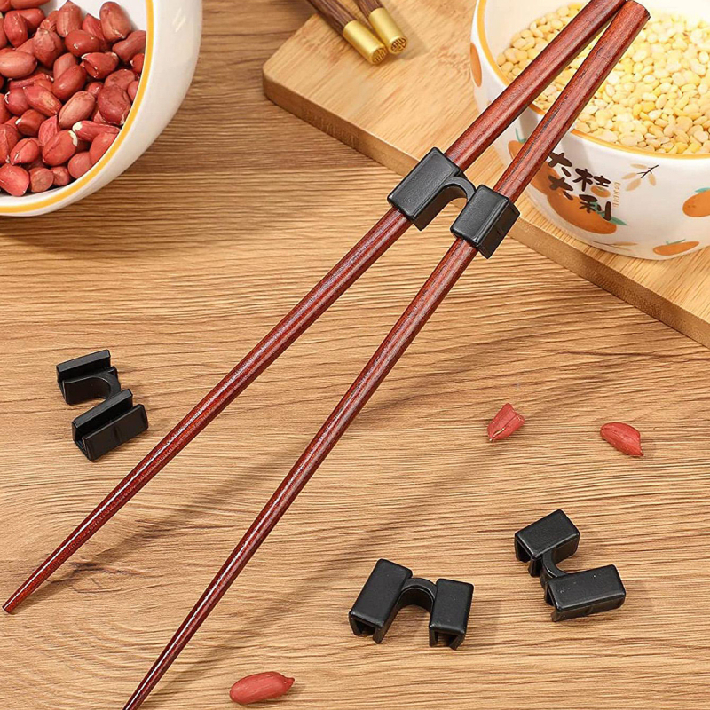 Tarpvalstybiniai karšto pardavimo lazdelių pagalbiniai valgymo maisto spaustukų mokymai, sujungti buitiniai pagalbiniai lazdelių treneriai