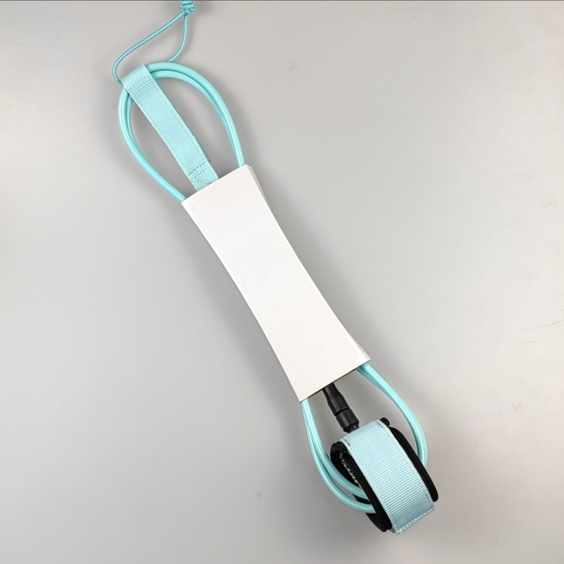 Sandėlyje esanti banglenčių virvė, 7 mm vielos skersmens, įvairių specifikacijų, banglenčių pėdų virvė su silikoniniu spaudiniu.