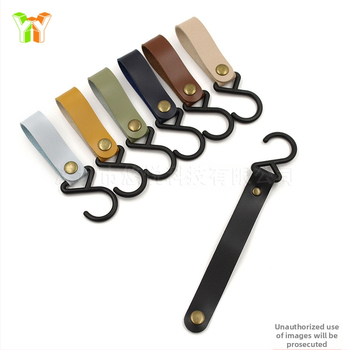 Laos S-tüüpi nahkkonks, õues kasutamiseks mõeldud telk, kaelarihmaga hoiukonks, koduköögi lauanõude organiseerimiskonks