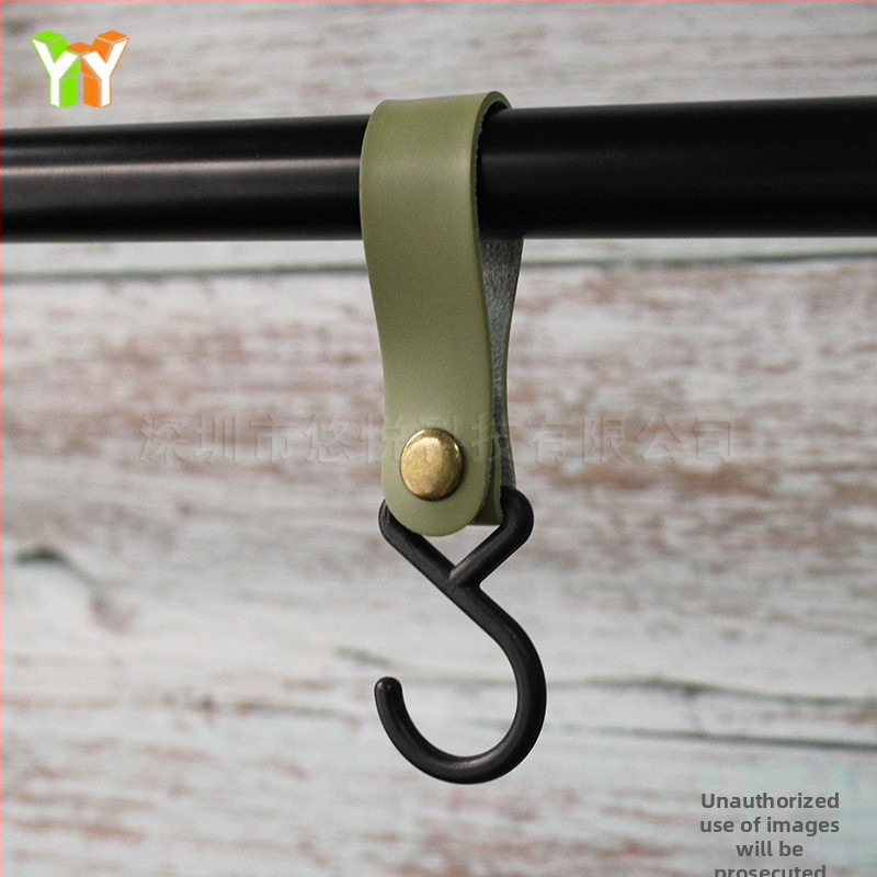 Laos S-tüüpi nahkkonks, õues kasutamiseks mõeldud telk, kaelarihmaga hoiukonks, koduköögi lauanõude organiseerimiskonks