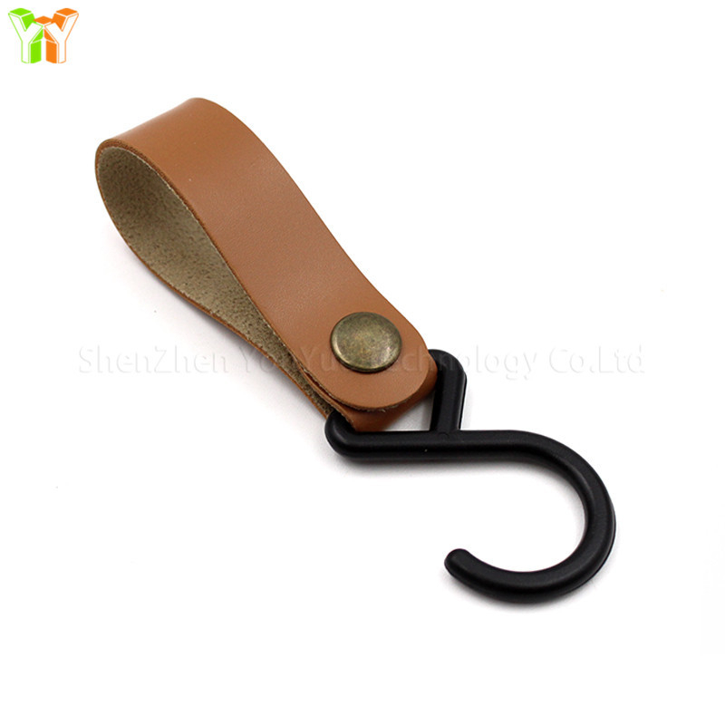 Laos S-tüüpi nahkkonks, õues kasutamiseks mõeldud telk, kaelarihmaga hoiukonks, koduköögi lauanõude organiseerimiskonks