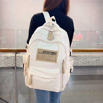 Piiriülene uue õpilase koolikott põhikooli keskkooli vanemkooli suure mahutavusega universaalne seljakott õuespordi vaba aja reisimiseks mõeldud seljakott