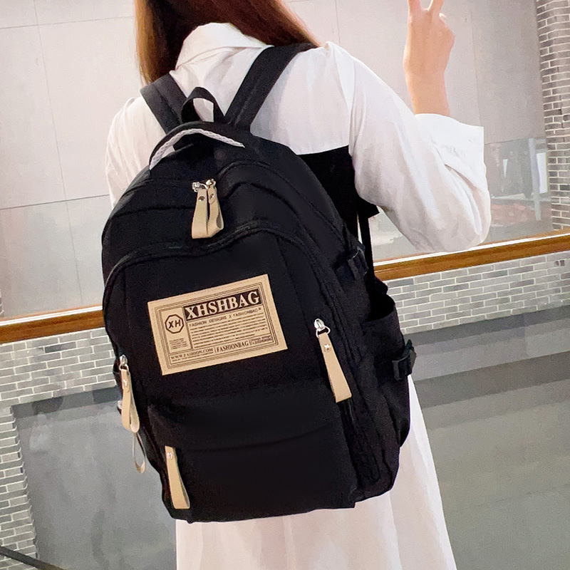 Piiriülene uue õpilase koolikott põhikooli keskkooli vanemkooli suure mahutavusega universaalne seljakott õuespordi vaba aja reisimiseks mõeldud seljakott