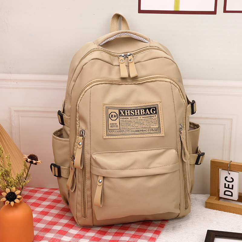 Piiriülene uue õpilase koolikott põhikooli keskkooli vanemkooli suure mahutavusega universaalne seljakott õuespordi vaba aja reisimiseks mõeldud seljakott