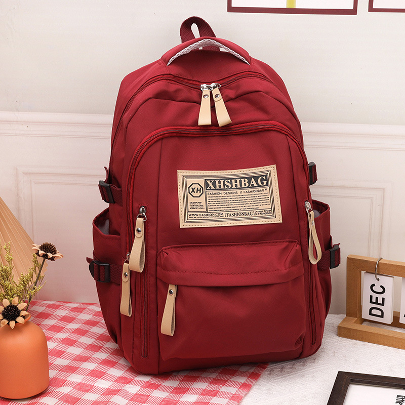 Piiriülene uue õpilase koolikott põhikooli keskkooli vanemkooli suure mahutavusega universaalne seljakott õuespordi vaba aja reisimiseks mõeldud seljakott