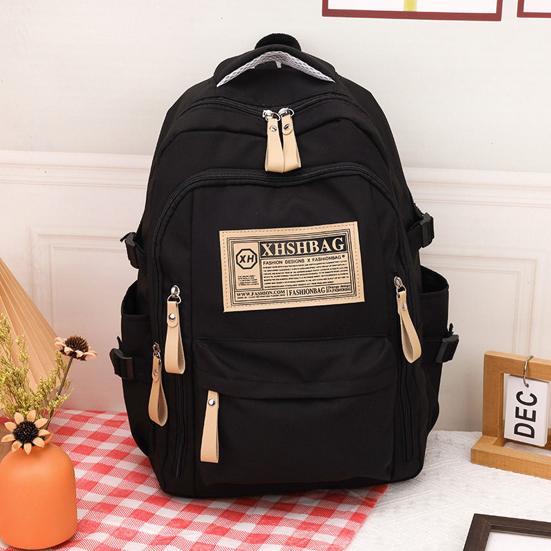 Piiriülene uue õpilase koolikott põhikooli keskkooli vanemkooli suure mahutavusega universaalne seljakott õuespordi vaba aja reisimiseks mõeldud seljakott