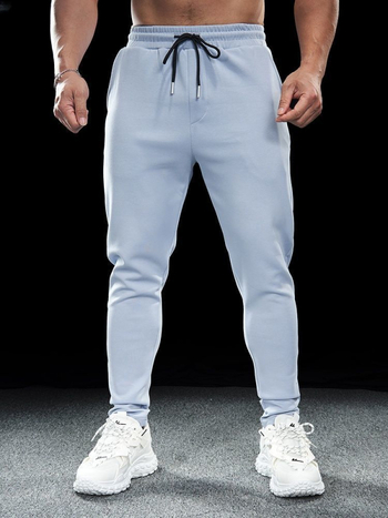 Sügise ja talve meeste spordi- ja vabaaja venivad jooksupüksid, kiiresti kuivavad, hingavad, õues kasutamiseks mõeldud treeningpüksid, õhukese lõikega jalapüksid