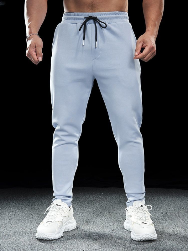 Sügise ja talve meeste spordi- ja vabaaja venivad jooksupüksid, kiiresti kuivavad, hingavad, õues kasutamiseks mõeldud treeningpüksid, õhukese lõikega jalapüksid