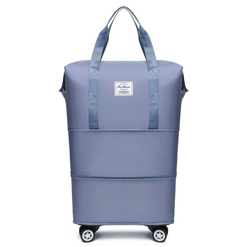 Lielas ietilpības ceļojumu soma ar dubultu izplešanās universālu riteņu rokassomu ceļojumu uzglabāšanas soma ar skriemeli bagāžas soma