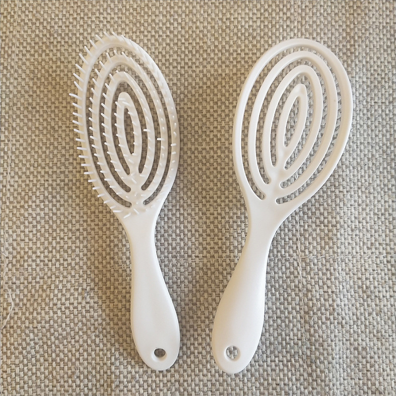 Karšto pardavimo tuščiavidurės šonkaulių šukos ovalios masažinės šukos macaron spalvos uodų spiralės šukos logotipo spausdinimas plastikinės šukos didmeninė prekyba