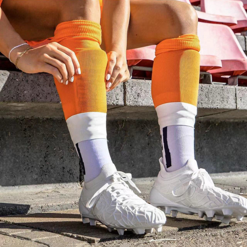 Silikoninė vyrų ir moterų futbolo lipni juosta kaklo apsaugai, skirta treniruotėms su neslystančiomis kojinėmis.