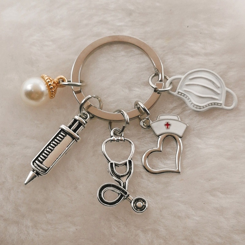 Maski süstla stetoskoop õe mütsi võtmehoidja arsti õe võtmehoidja kingitus piiriülene