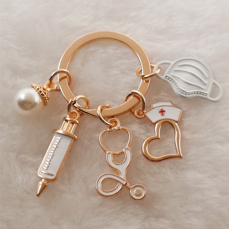 Maski süstla stetoskoop õe mütsi võtmehoidja arsti õe võtmehoidja kingitus piiriülene