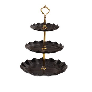 Euroopa stiilis plastmassist mitmekihiline puuviljataldrik, elutoa kohvilaud, kommitaldrik, esiküljel olev koogirest, kolmekihiline magustoidulaua kaunistused