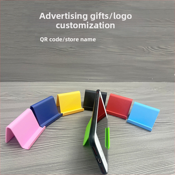 „Ditui“ dovanų reklaminis mobiliojo telefono laikiklis su spausdintu logotipu ir tekstu. Paprastas nešiojamas stalinis mobiliojo telefono laikiklis, didmeninė prekyba.