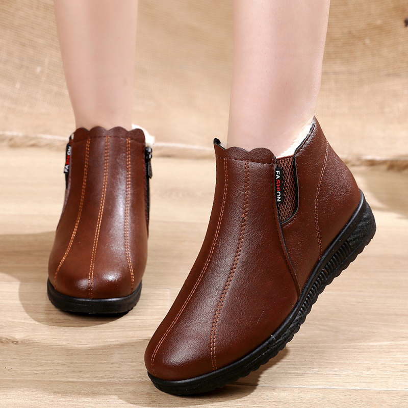 Téli új vastag és bársony anyacipő lapos talpú középkorú rövid csizma női csúszásmentes meleg pamut cipő időseknek nagykereskedelem