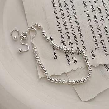 Γυναικείο βραχιόλι με στρογγυλές χάντρες από ασήμι 925, με ρυθμιζόμενες τσέπες, σε ψυχρό στυλ, σε niche design, απλό βραχιόλι με χάντρες από φασόλι και φως.