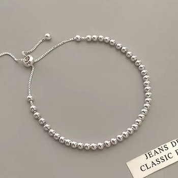 Γυναικείο βραχιόλι με στρογγυλές χάντρες από ασήμι 925, με ρυθμιζόμενες τσέπες, σε ψυχρό στυλ, σε niche design, απλό βραχιόλι με χάντρες από φασόλι και φως.