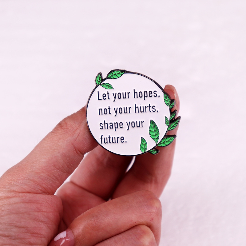 Robert Shule`i kuulsate sõnade prossi ja rinnamärgi aksessuaarid