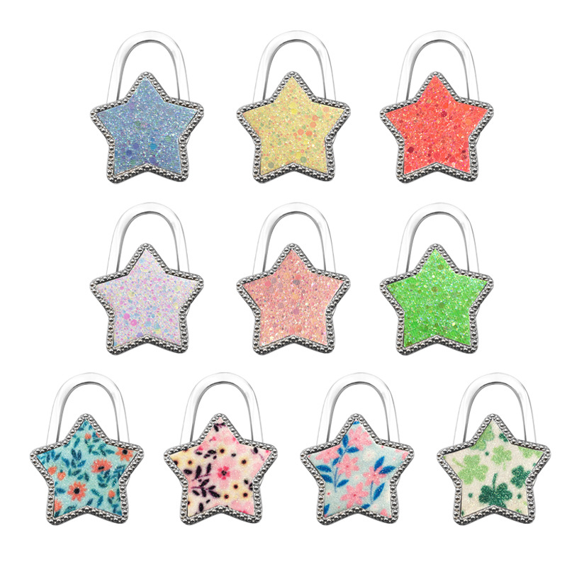 Moodne loominguline tähekujuline rippkoti konksuvärviline viieharuline tähekujuline ripats ehe kokkupandav kaasaskantav lauapoolne naiste kotikonks