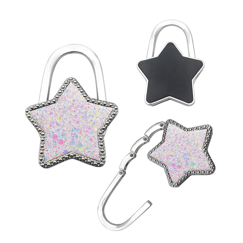 Moodne loominguline tähekujuline rippkoti konksuvärviline viieharuline tähekujuline ripats ehe kokkupandav kaasaskantav lauapoolne naiste kotikonks