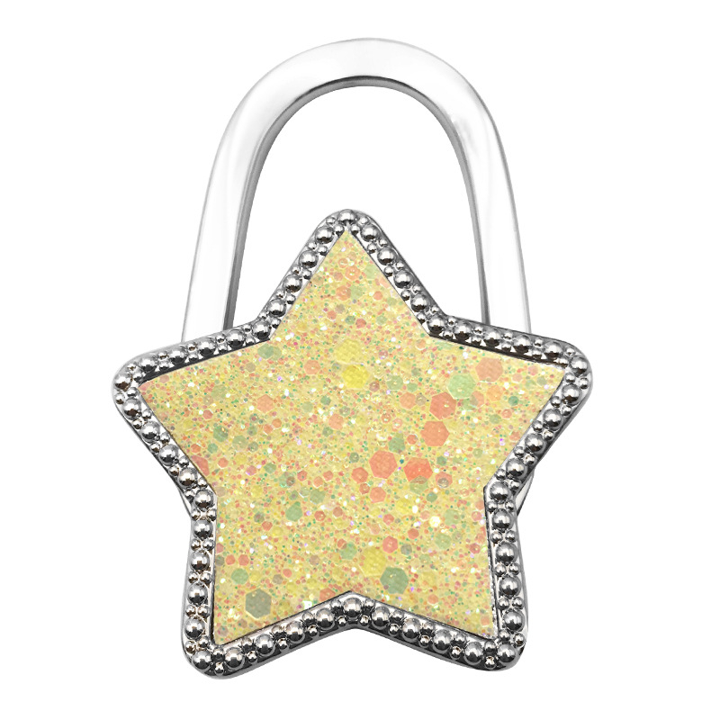 Moodne loominguline tähekujuline rippkoti konksuvärviline viieharuline tähekujuline ripats ehe kokkupandav kaasaskantav lauapoolne naiste kotikonks