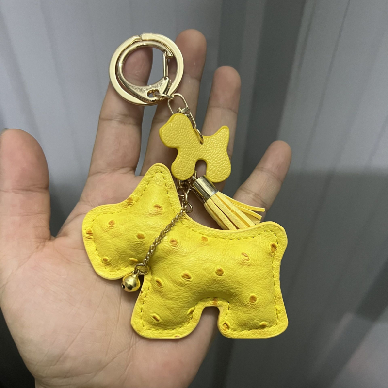 Határokon átnyúló kreatív ajándék csengő kiskutya autó kulcstartó autó kulcstartó táska medál aranyos medál bojt