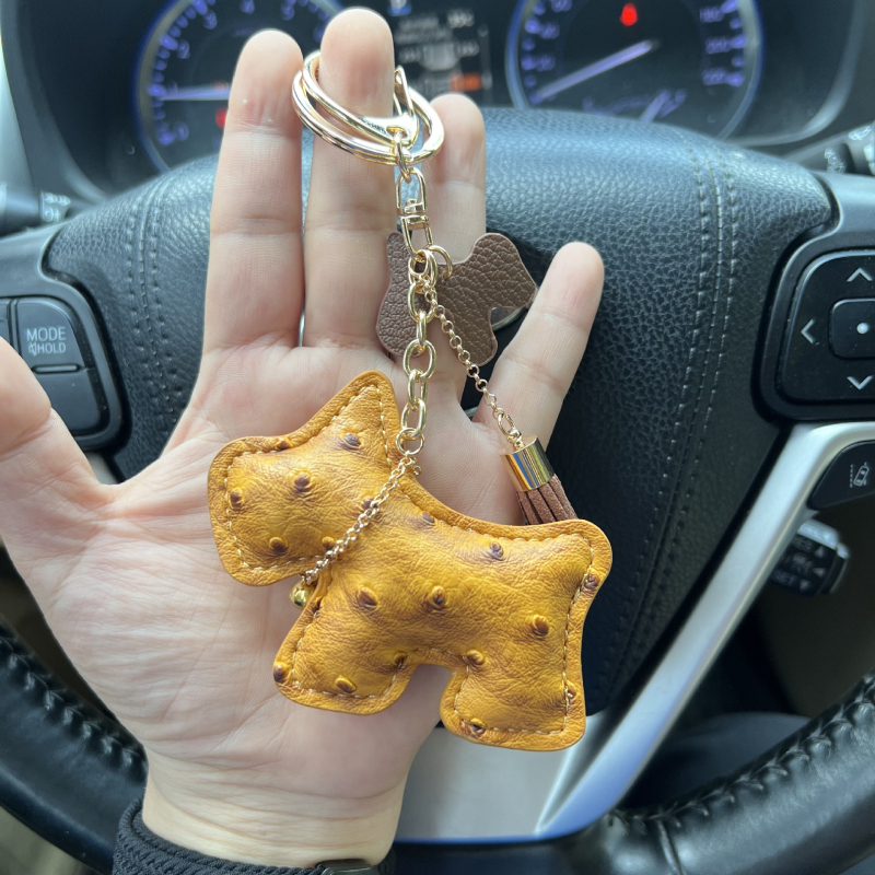 Határokon átnyúló kreatív ajándék csengő kiskutya autó kulcstartó autó kulcstartó táska medál aranyos medál bojt