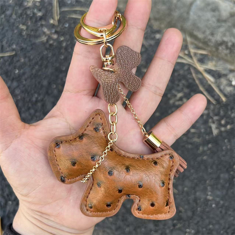 Határokon átnyúló kreatív ajándék csengő kiskutya autó kulcstartó autó kulcstartó táska medál aranyos medál bojt