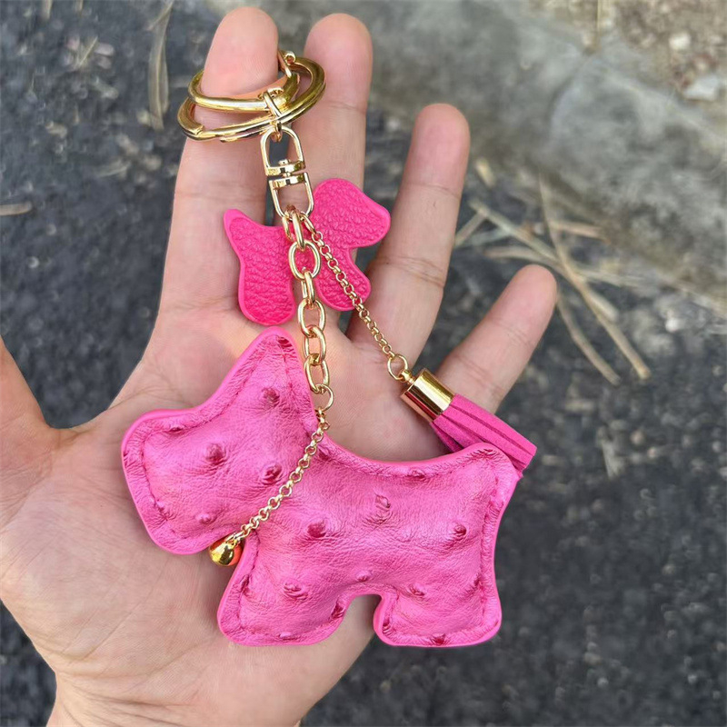 Határokon átnyúló kreatív ajándék csengő kiskutya autó kulcstartó autó kulcstartó táska medál aranyos medál bojt