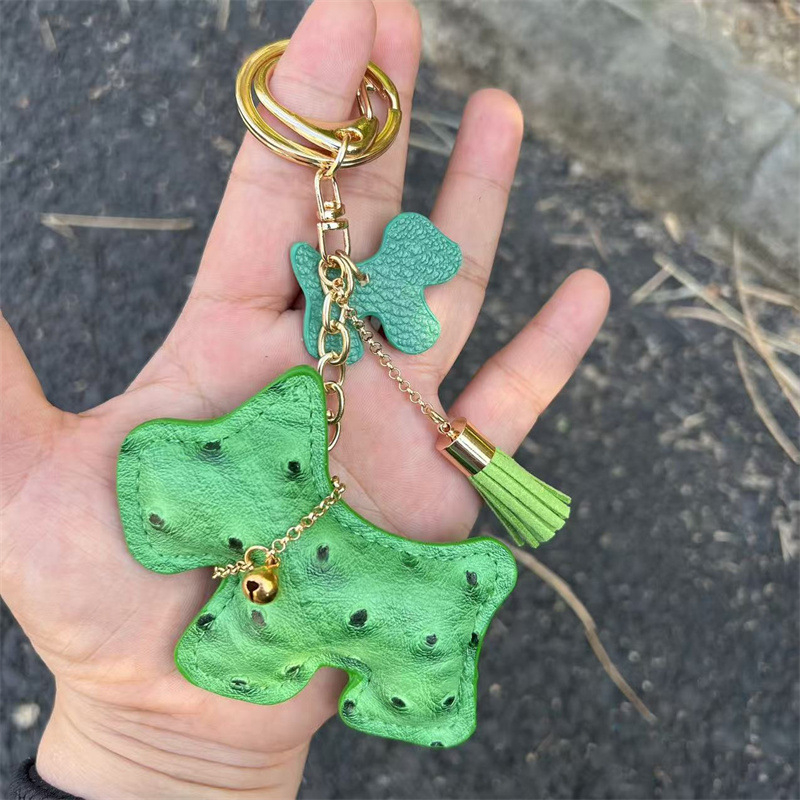 Határokon átnyúló kreatív ajándék csengő kiskutya autó kulcstartó autó kulcstartó táska medál aranyos medál bojt