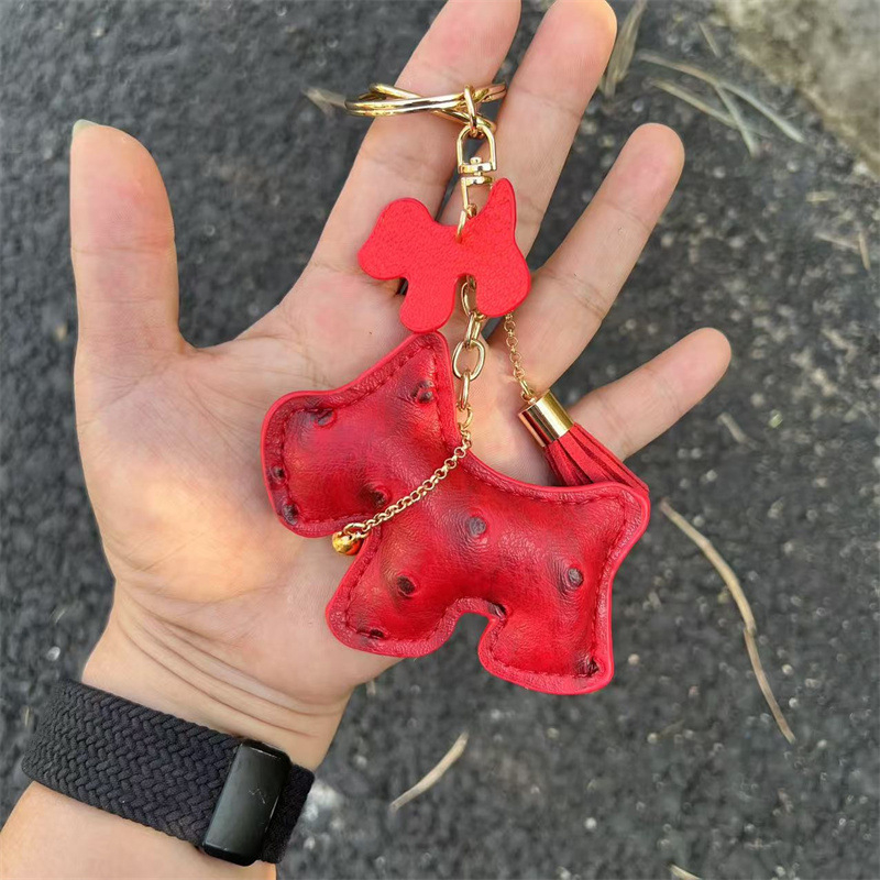 Határokon átnyúló kreatív ajándék csengő kiskutya autó kulcstartó autó kulcstartó táska medál aranyos medál bojt