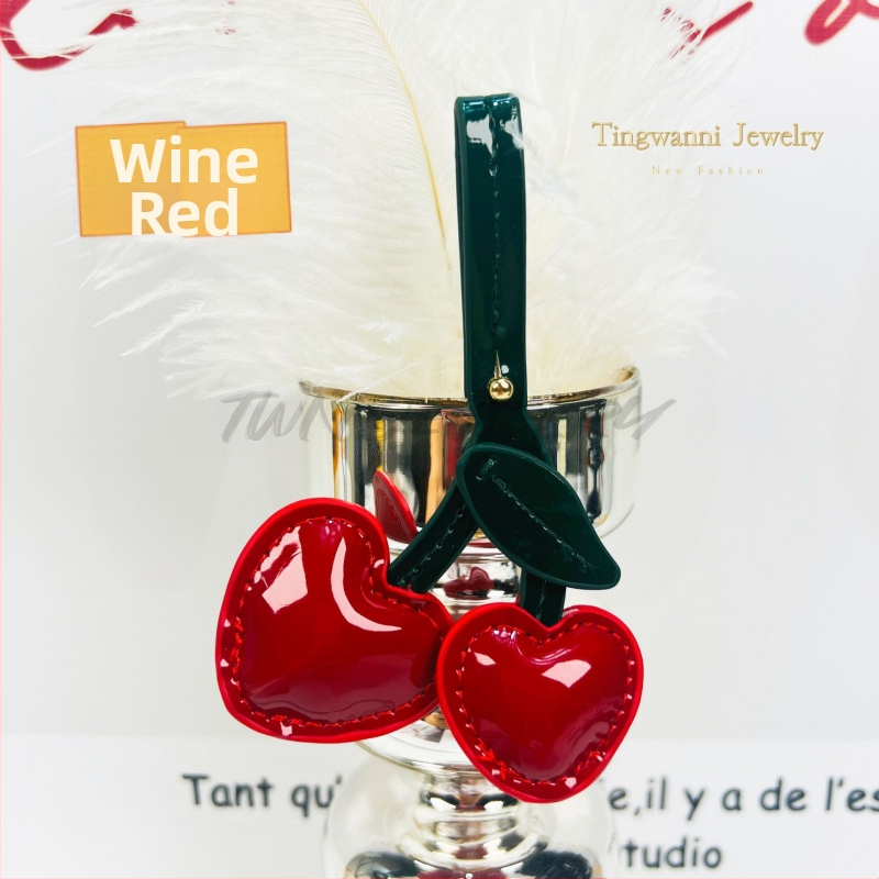 Vyšninės spalvos raktų pakabuko vyšninės spalvos kūrybinis krepšys pakabukas mokyklinis krepšys meilės odinis krepšys pakabuko aksesuarai