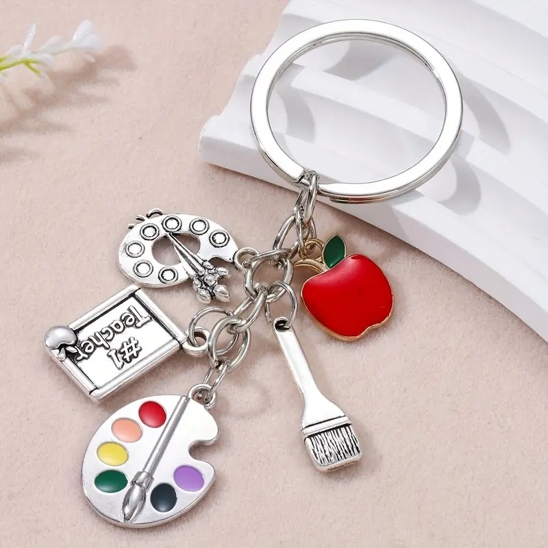 Moodne joonistuslaud, pliiatsihoidja, värvipalett, pintsel, kunstiõpilane, võtmehoidja, maalimise armastaja, piiriülene võtmehoidja