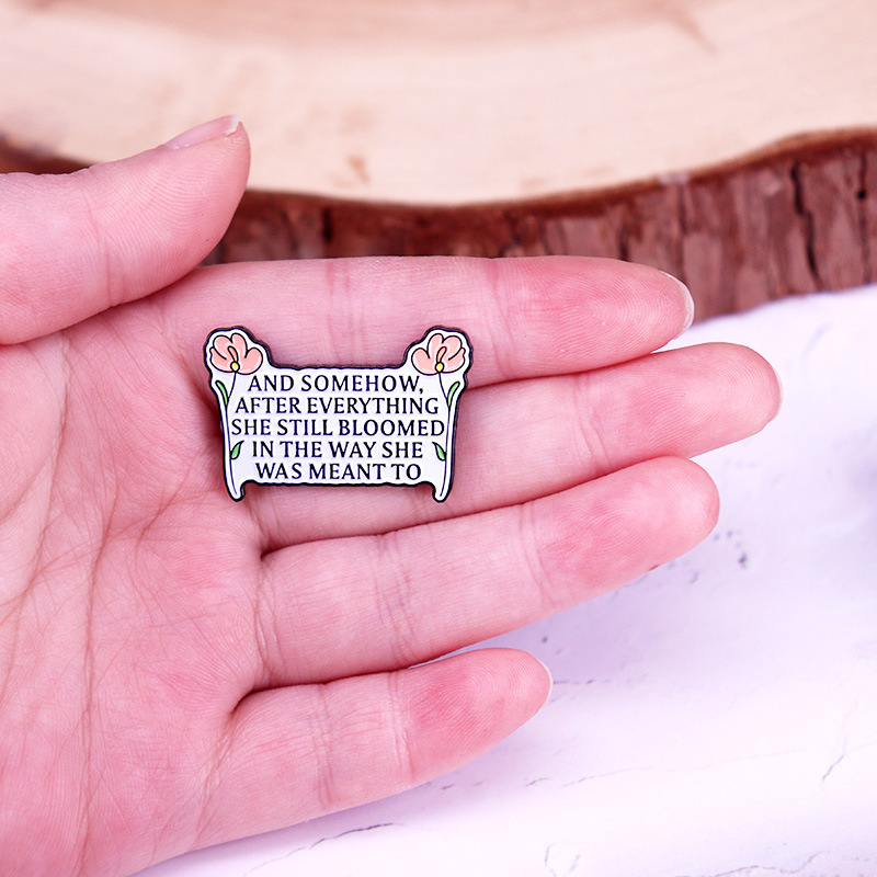 Някак си, след всичко това, тя все още цъфтеше по начина, по който ѝ беше писано.