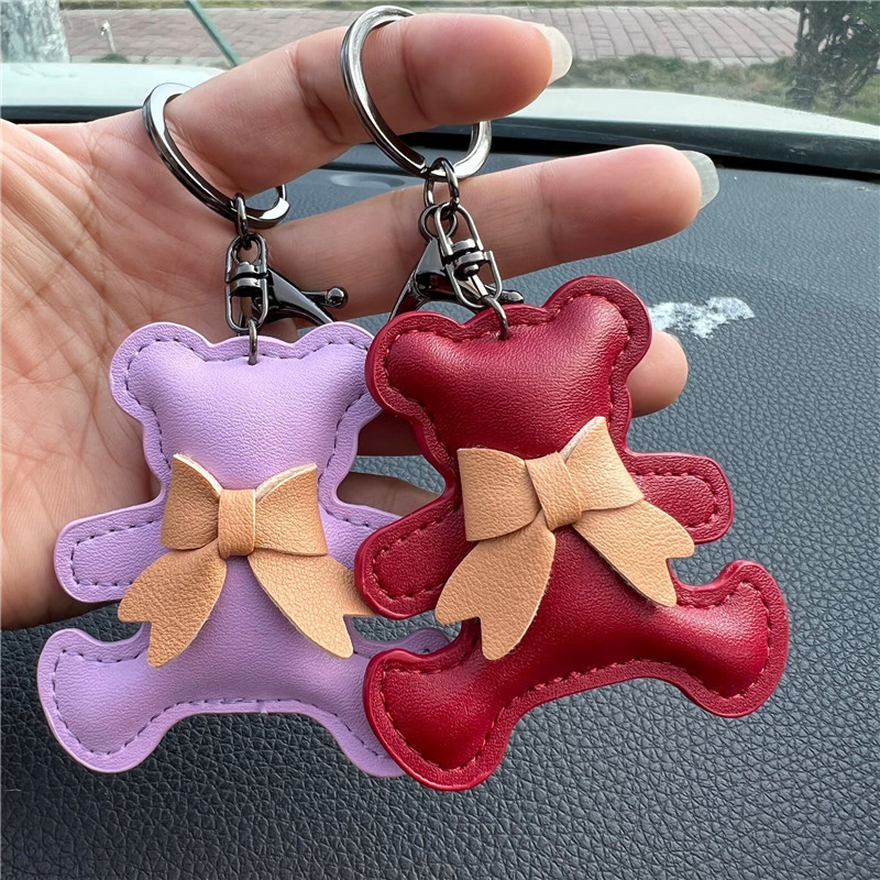 Kreatív ajándék bőr masni medvés autós kulcstartó táska medál aranyos autós kulcstartó gyűrű medál