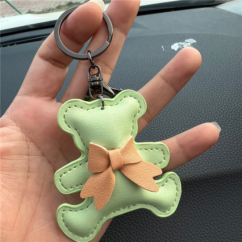 Kreatív ajándék bőr masni medvés autós kulcstartó táska medál aranyos autós kulcstartó gyűrű medál