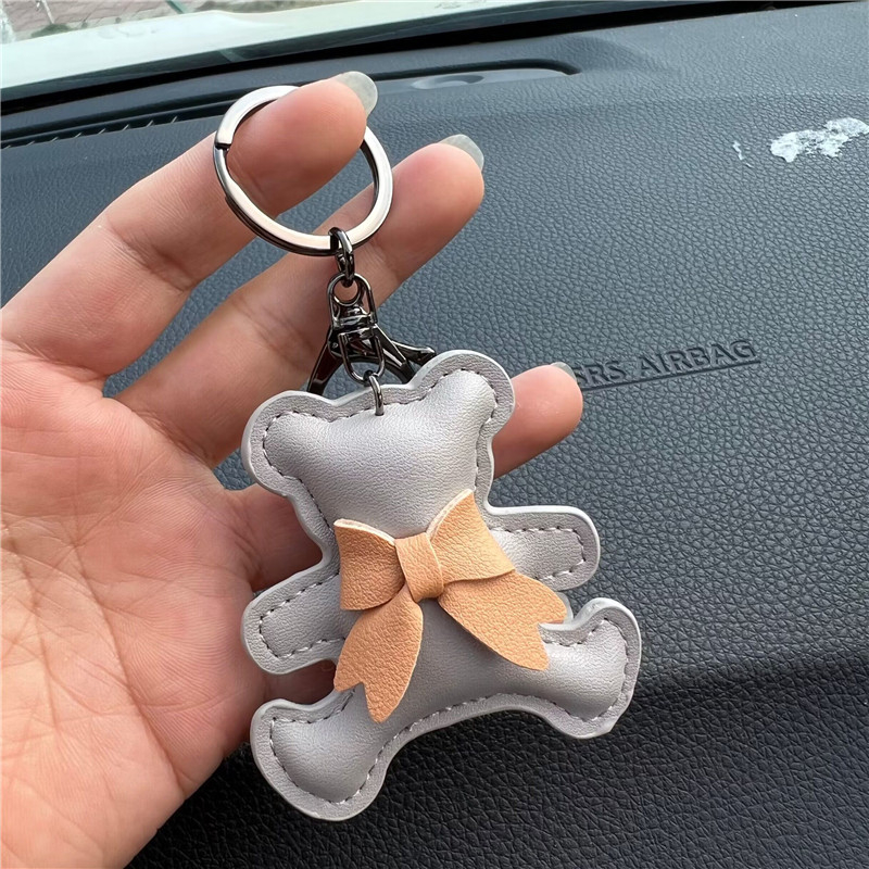 Kreatív ajándék bőr masni medvés autós kulcstartó táska medál aranyos autós kulcstartó gyűrű medál